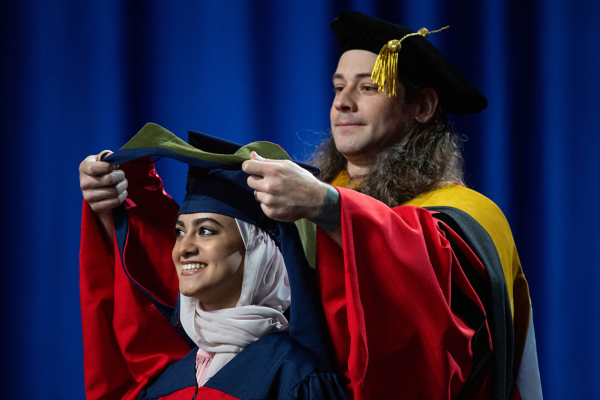 Graduate student being hooded