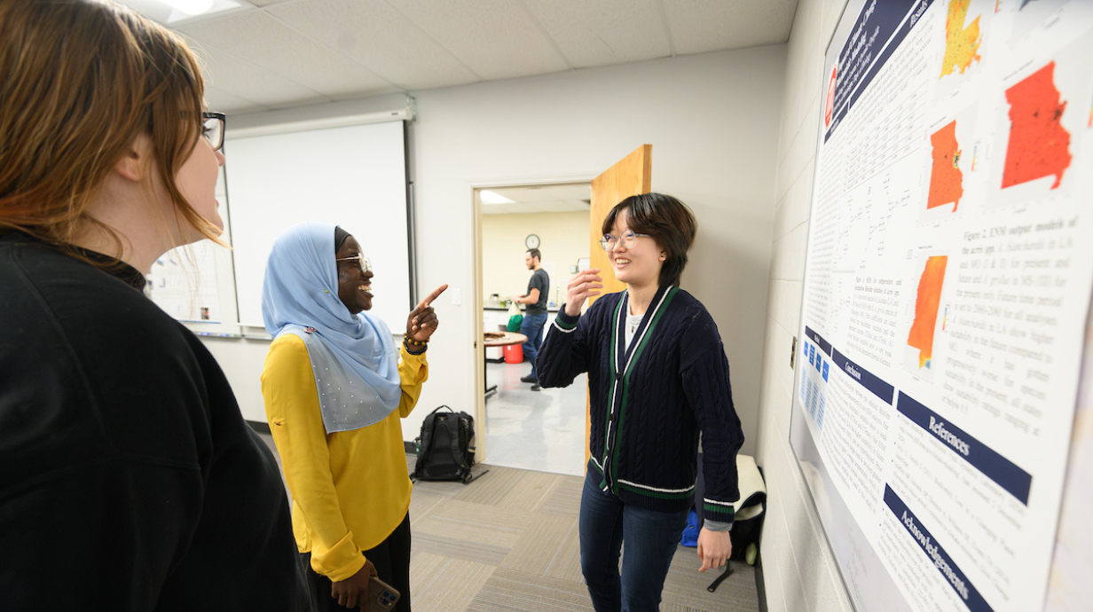 Students discussing their projects