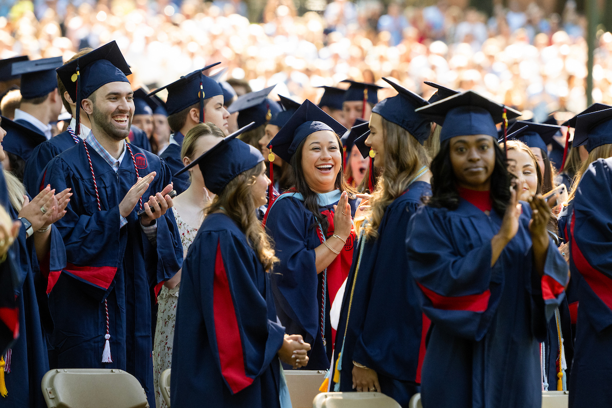 Student at graduation in the Grove