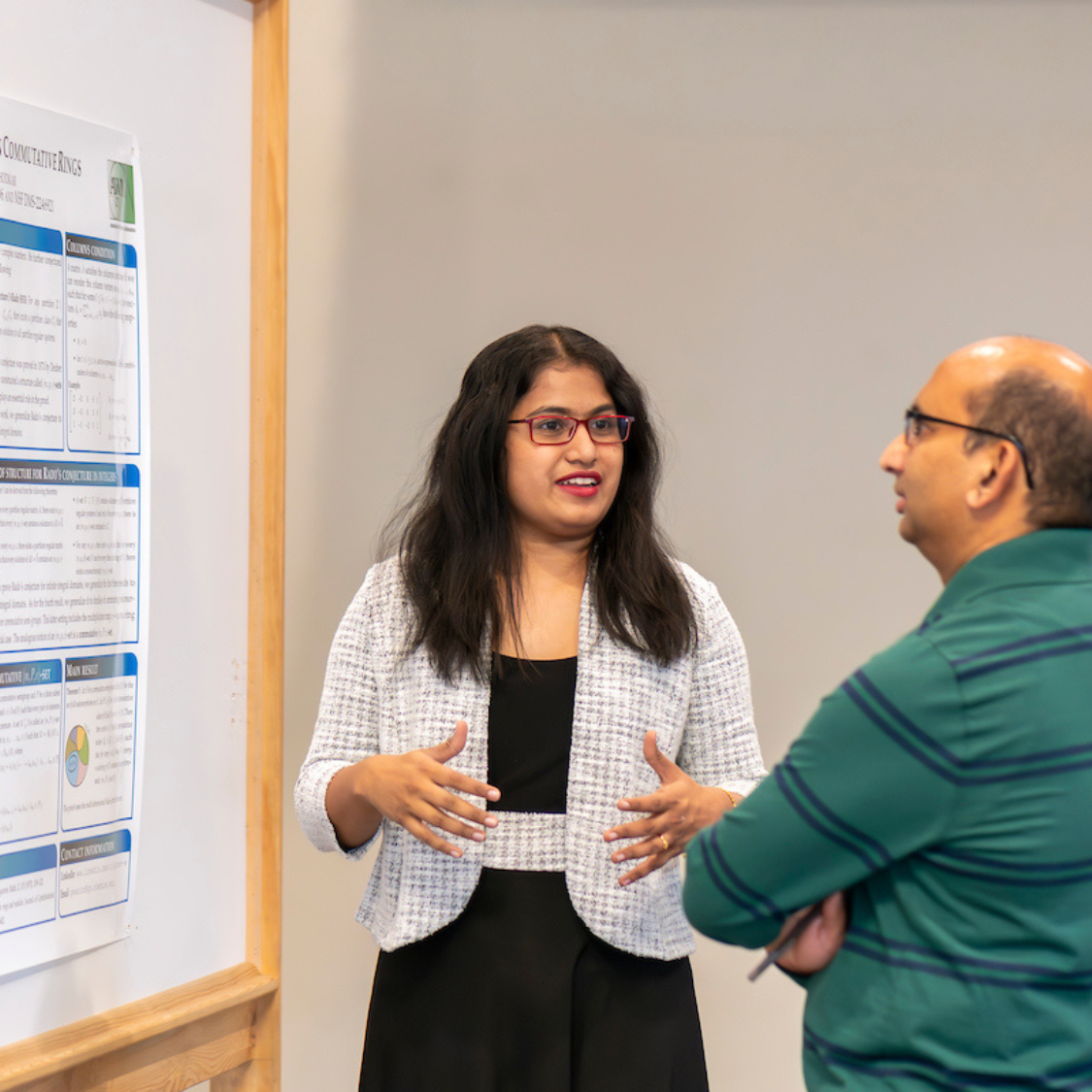 Graduate student presenting her work.