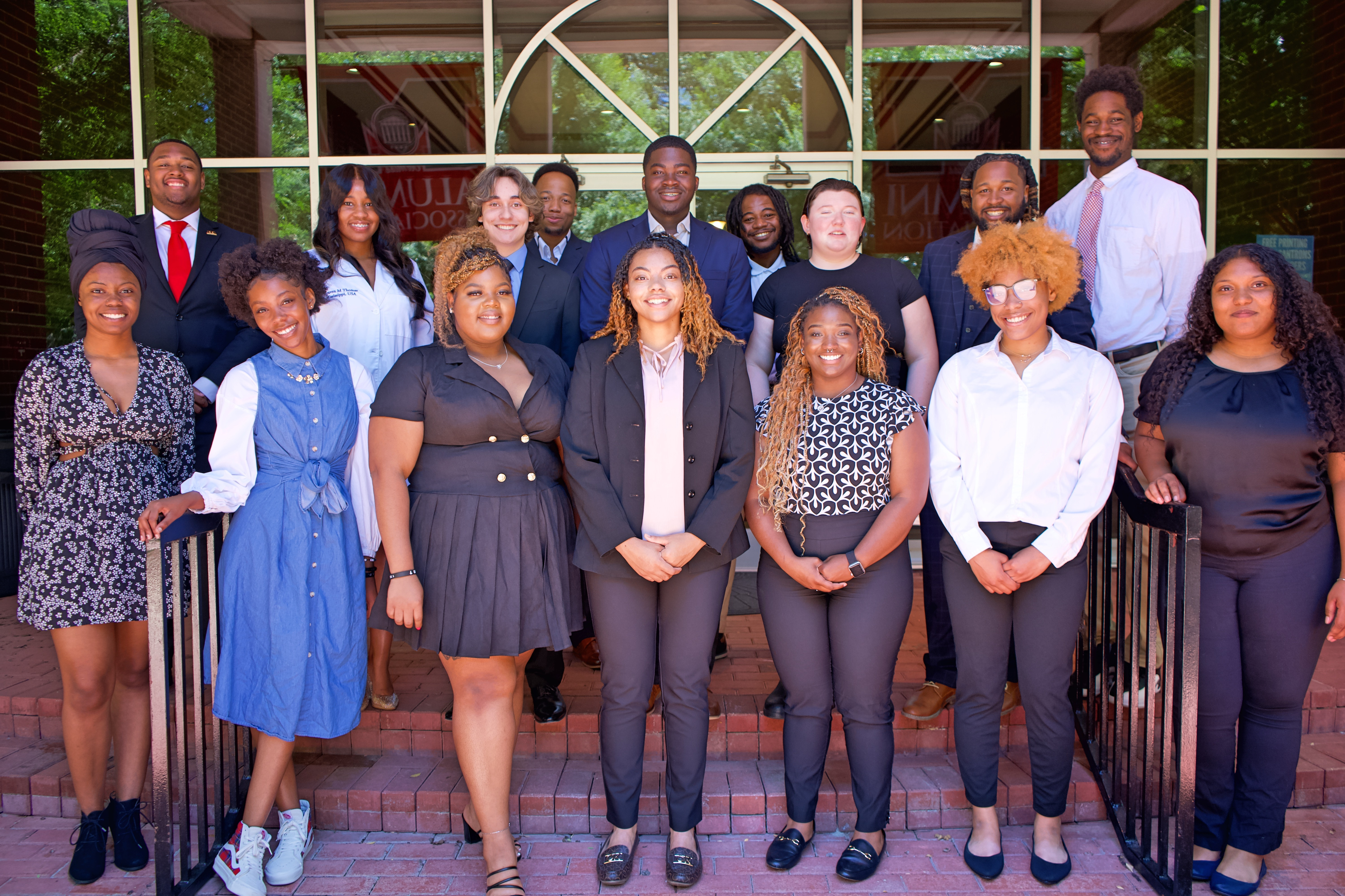 Students in the McNair Program pose in front of Butler Auditorium.